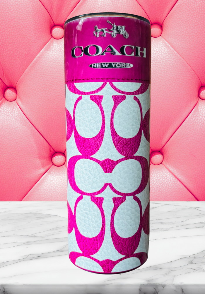 A 20 oz stainless steel insulated tumbler featuring a white and pink leather-inspired background with the signature 