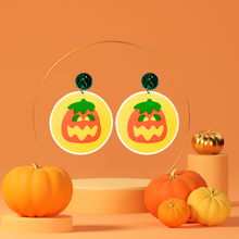 Load image into Gallery viewer, Orange jewelry display featuring earrings that look like Pillsbury pumpkin sugar cookies
