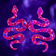 Load image into Gallery viewer, Close-up of Pink Sparkle Serpent Earrings with vibrant pink glitter design, perfect for Halloween or bold fashion statements.
