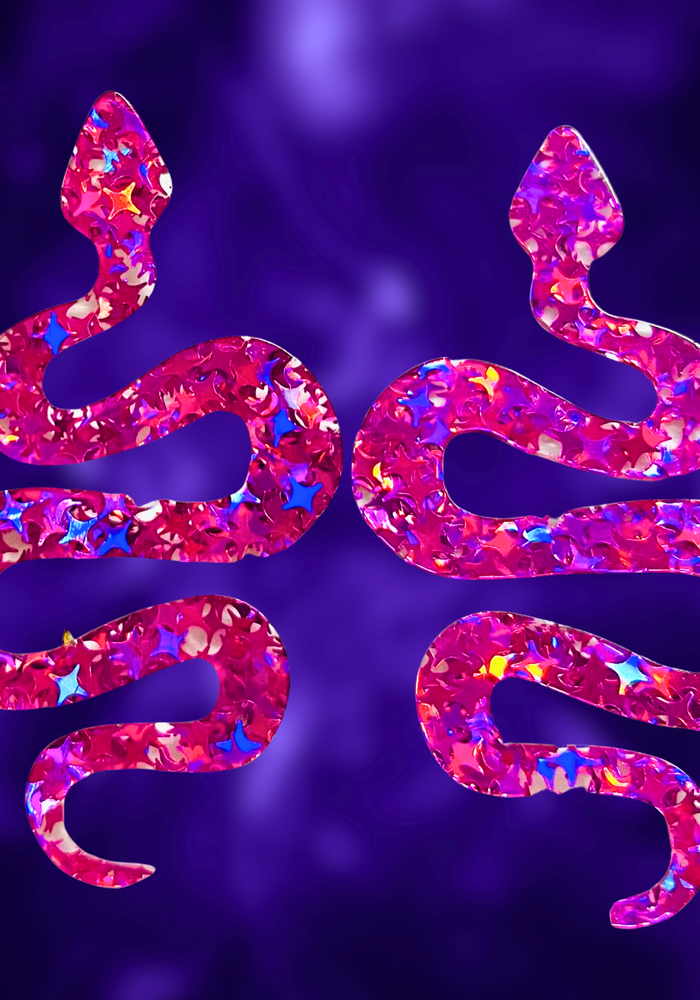 Close-up of Pink Sparkle Serpent Earrings with vibrant pink glitter design, perfect for Halloween or bold fashion statements.