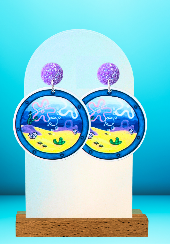 SpongeBob Pineapple Home View Earrings – Celebrate the charm and adventures of Bikini Bottom with these elegant earrings, reminiscent of SpongeBob’s quirky world