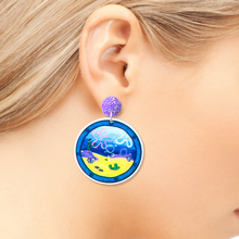 Load image into Gallery viewer, A close up of an ear wearing the Spongebob porthole earrings
