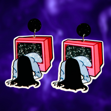 Load image into Gallery viewer, Earrings featuring a cartoon-style figure climbing out of a TV, inspired by The Ring, perfect for fans of horror movies and unique Halloween accessories.
