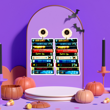 Load image into Gallery viewer, Earrings featuring a stack of classic cult horror VHS tapes, including Brain Damage, Firestarter, and Chopping Mall, ideal for fans of vintage horror movies. Earrings are on a purple earring stand.
