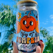 Load image into Gallery viewer, A 16 oz BPA-free glass cup featuring a cute pumpkin design with the words “Yay it’s Pumpkin Season.” Comes with a bamboo lid and reusable glass straw, perfect for autumn drinks.
